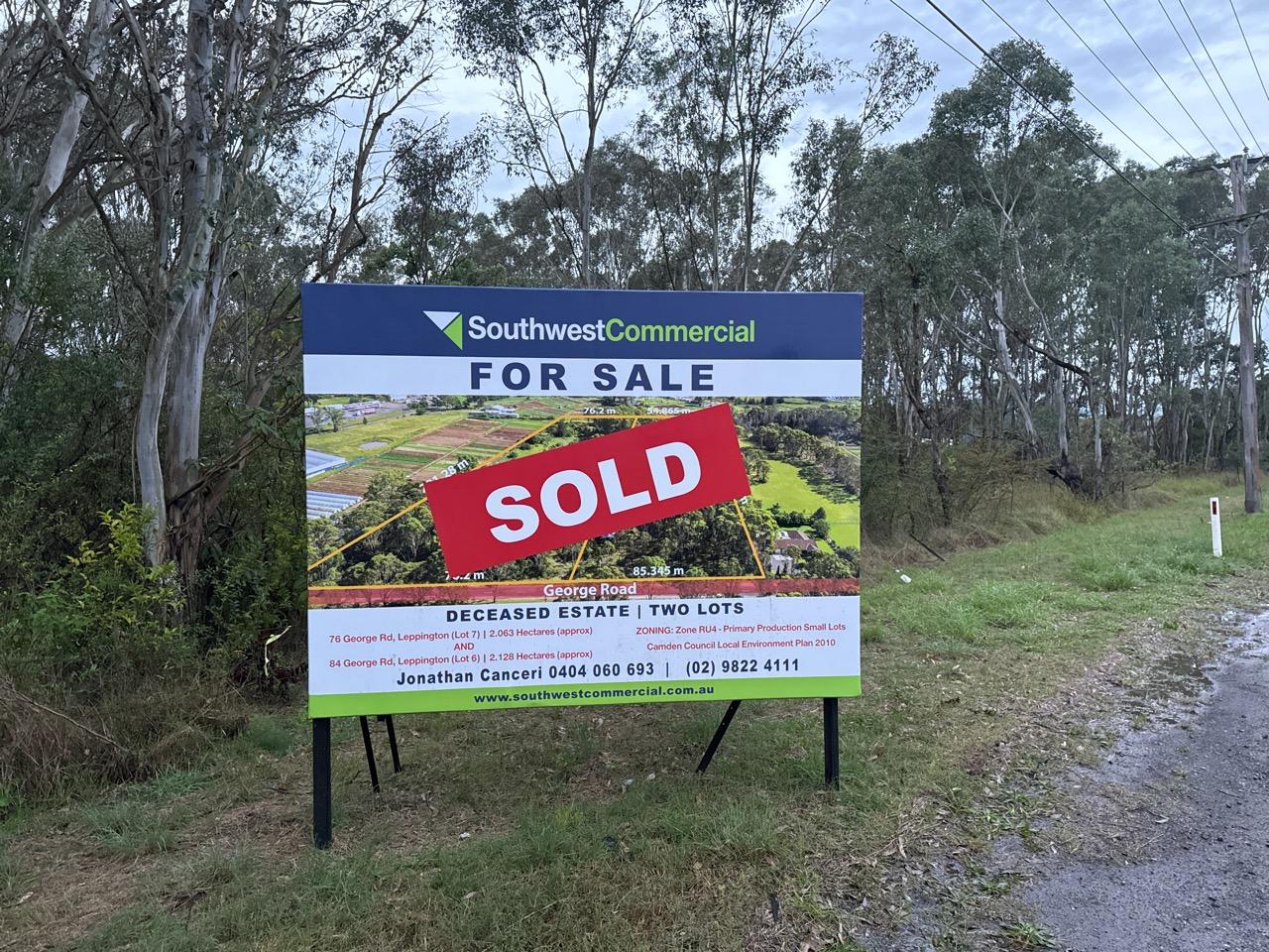 Sold Southwest Commercial sign at a roadside property